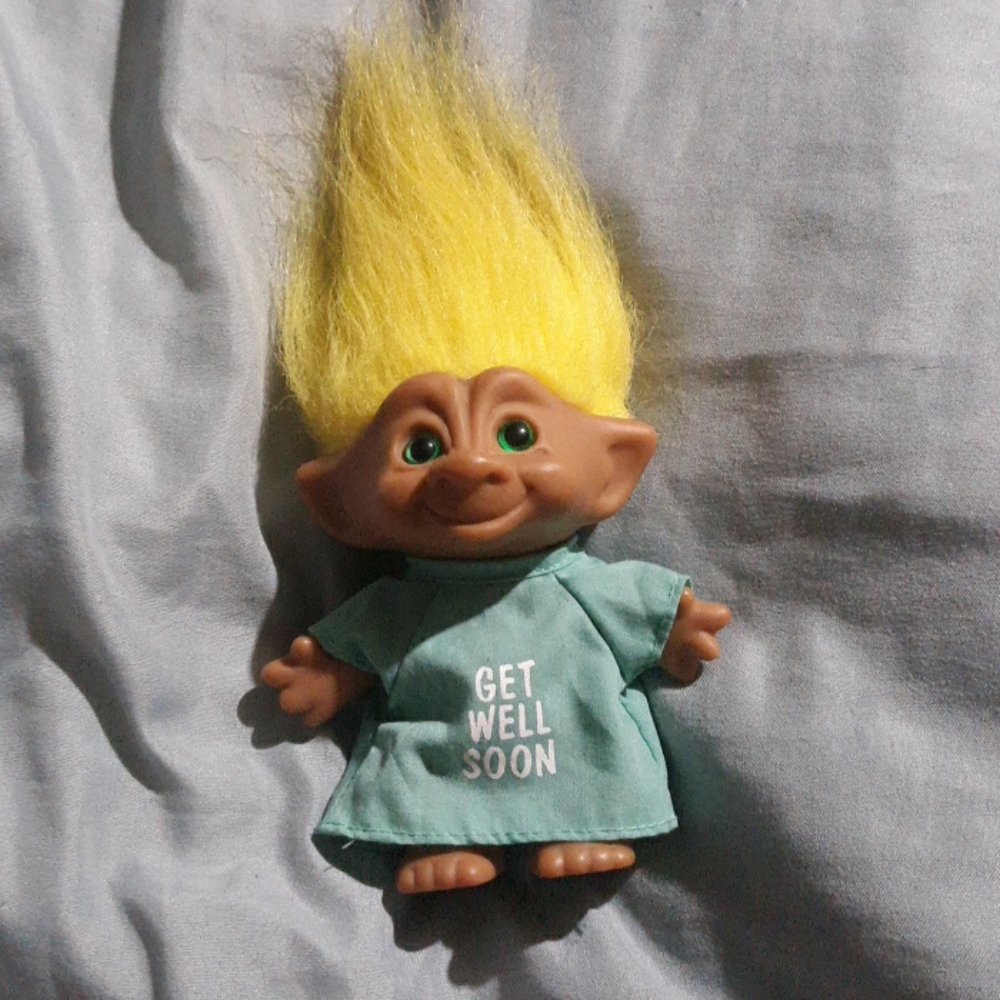 Yellow haired cute ace troll